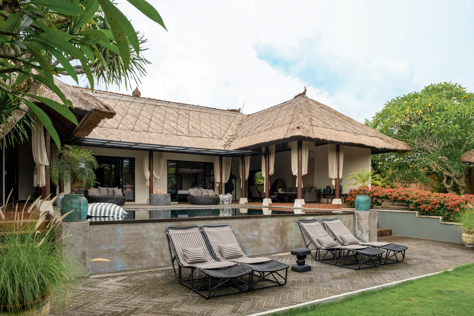 Central freshwater lap pool and open living pavilions at Tigertale Villa